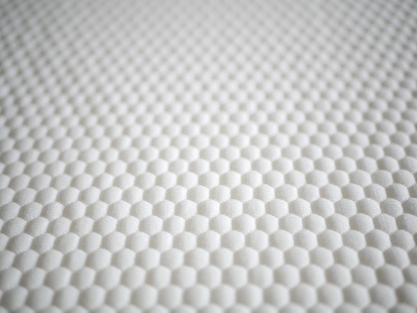 surface du sur-matelas Eve