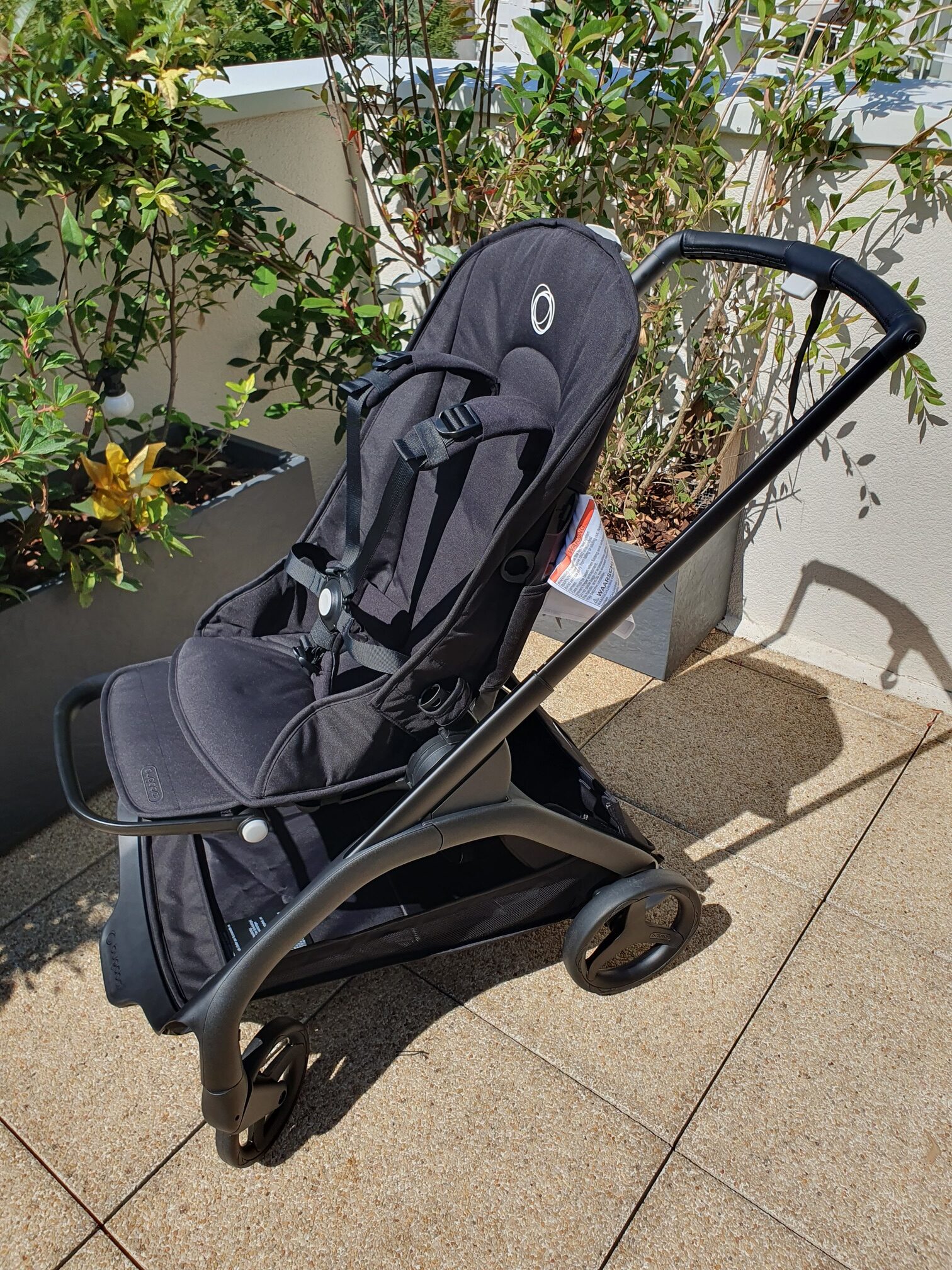 Le harnais de la poussette Dragonfly de Bugaboo.